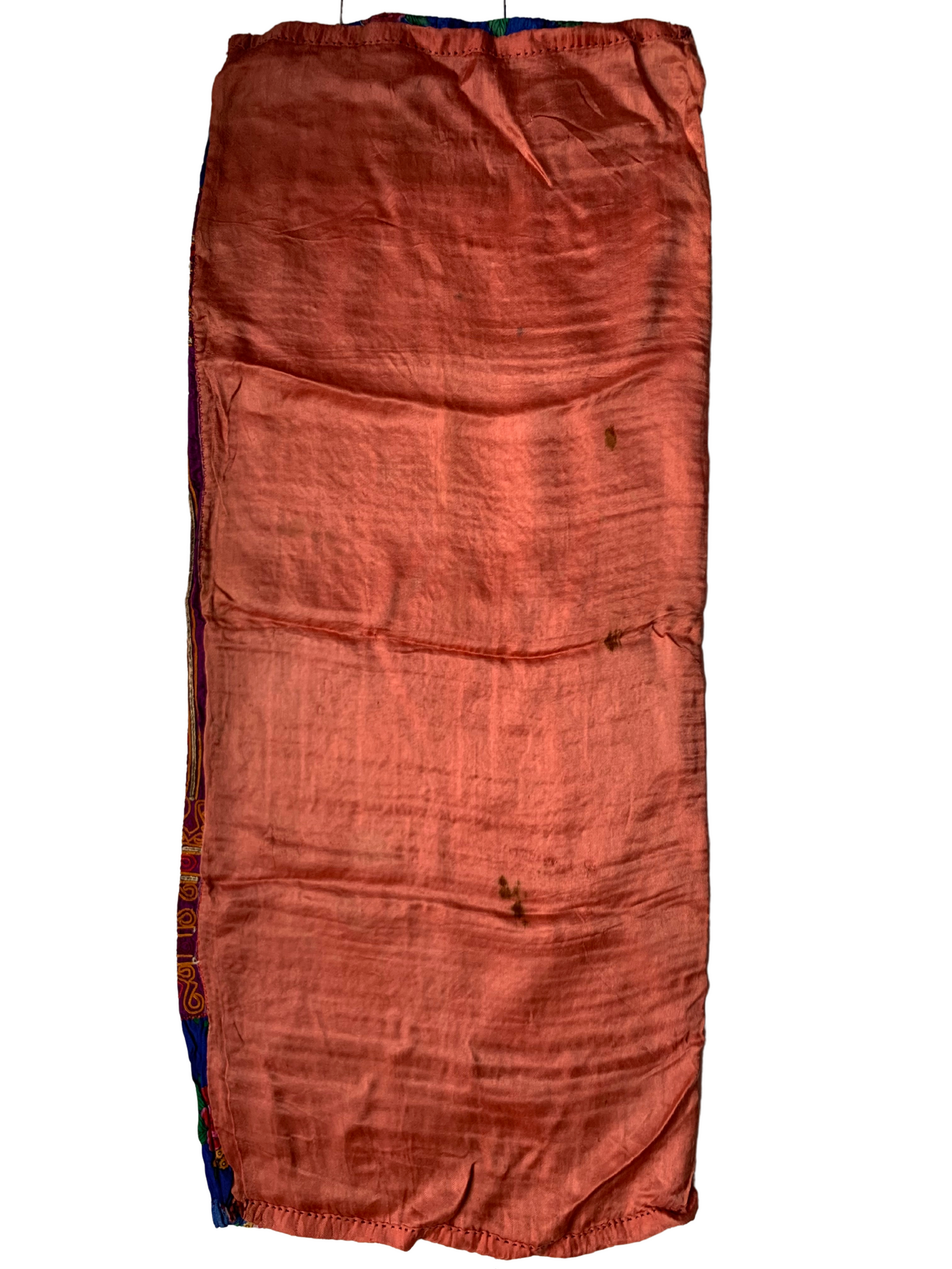 TEXTILE WITH ORANGE EMBROIDERY