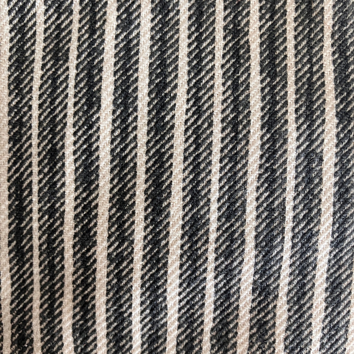Red cushion with striped backing