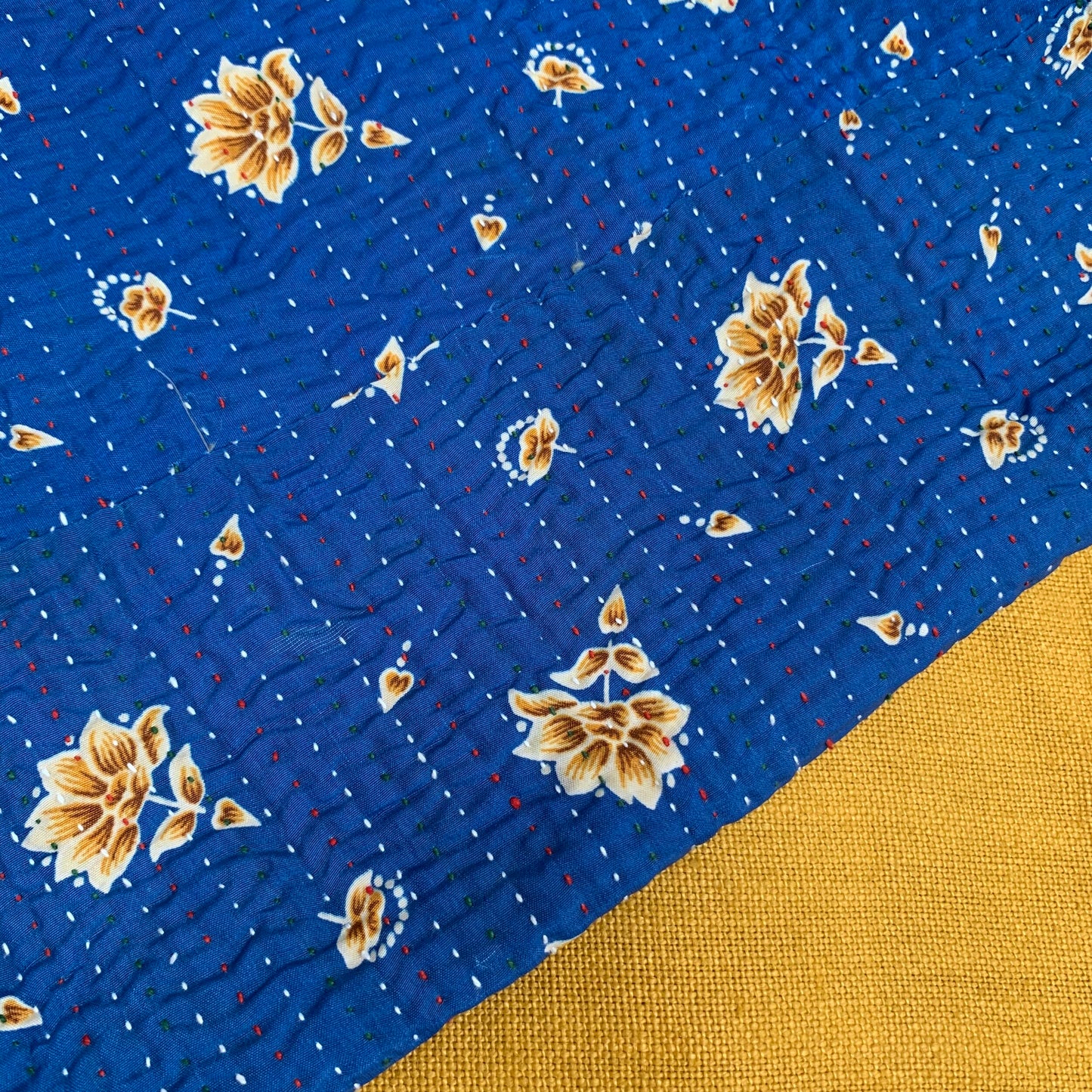 Blue and yellow floral kantha cushion