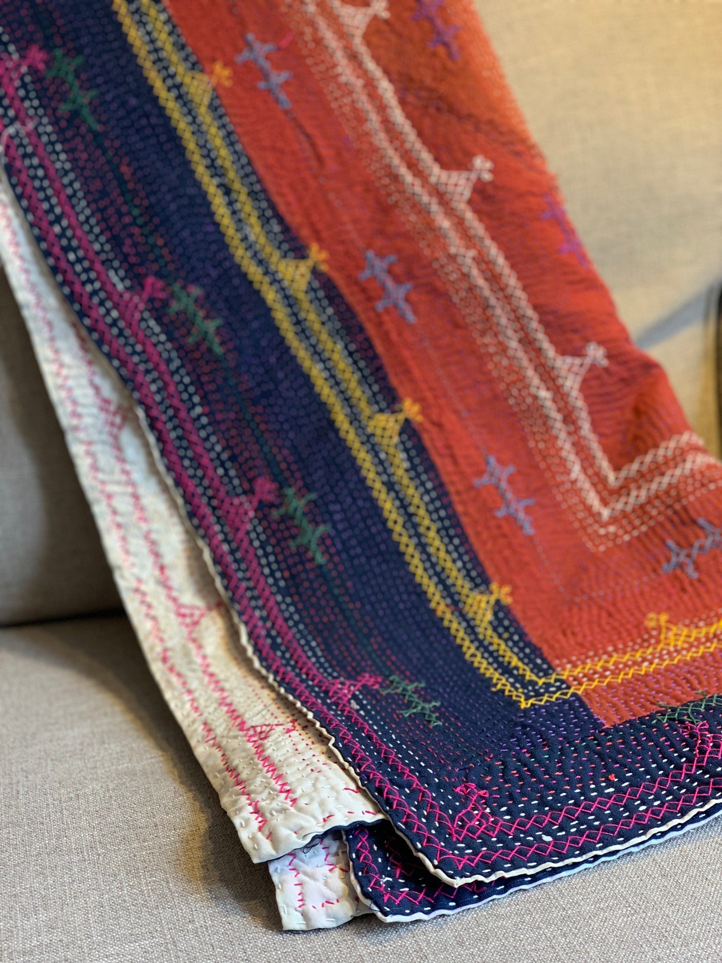 Hand-embroidered red Sami quilt